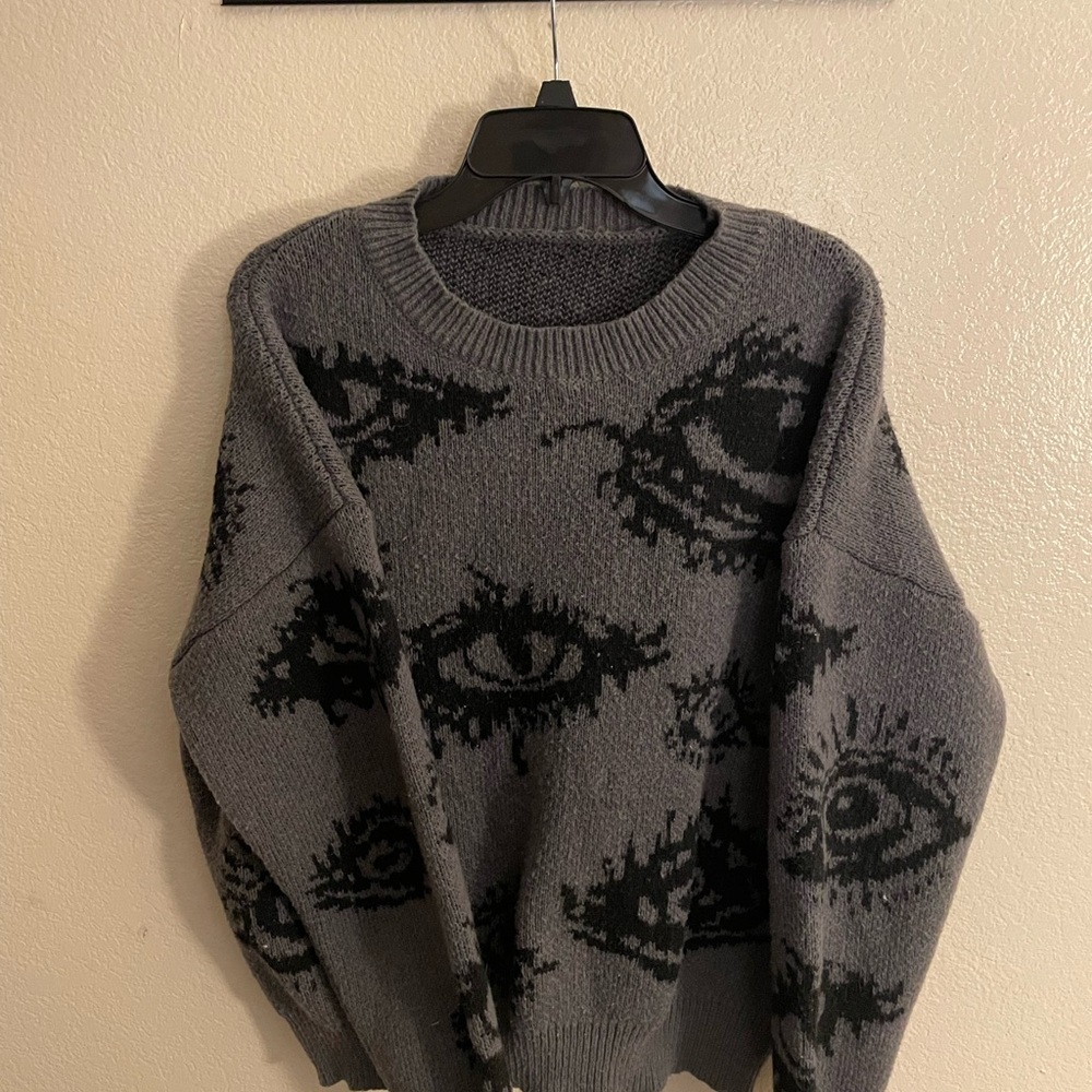 Gray Sweater with Eye Pattern